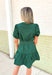 Autumn Charm Dress in Forest, forest green puff sleeve & tiered dress with v-neck, tie belt detail and pockets 