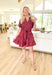 Autumn Charm Dress in Red Brown, burgundy puff sleeve tiered mini dress with v-neck, pockets, and tie belt detail 