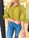 Best Effort Blouse in Olive, quarter sleeve blouse with ruffle detail around the neck and on the shoulders, v-neck line, ruffling on the bottom of the sleeves 