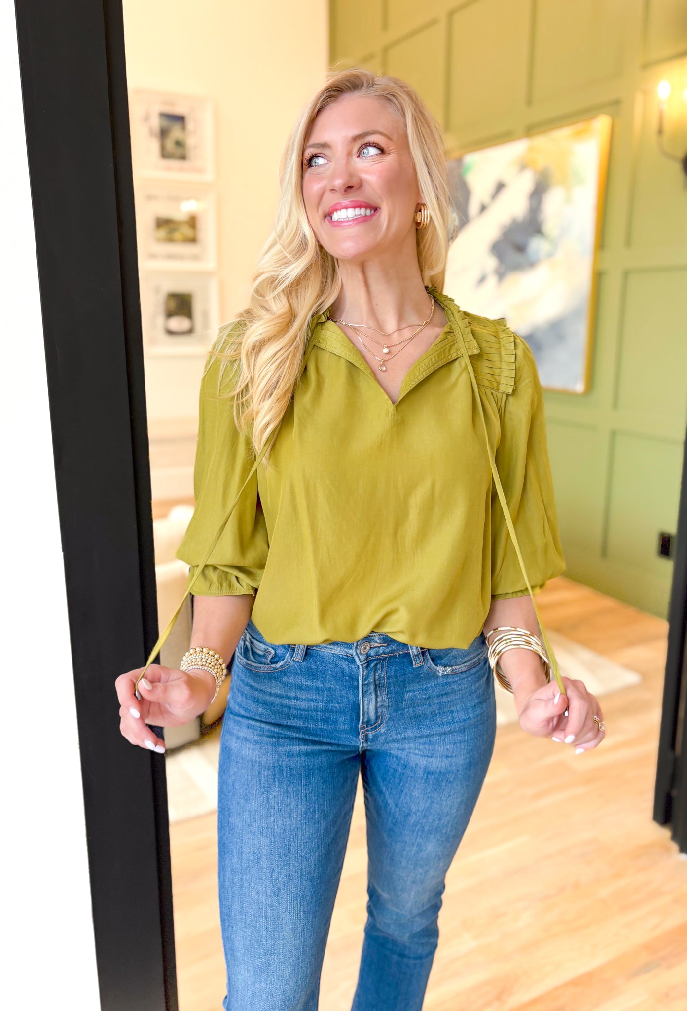 Best Effort Blouse in Olive, quarter sleeve blouse with ruffle detail around the neck and on the shoulders, v-neck line, ruffling on the bottom of the sleeves 