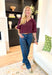 Best Effort Blouse in Merlot, quarter sleeve blouse with ruffle detail around the neck and on the shoulders, v-neck line, ruffling on the bottom of the sleeves 