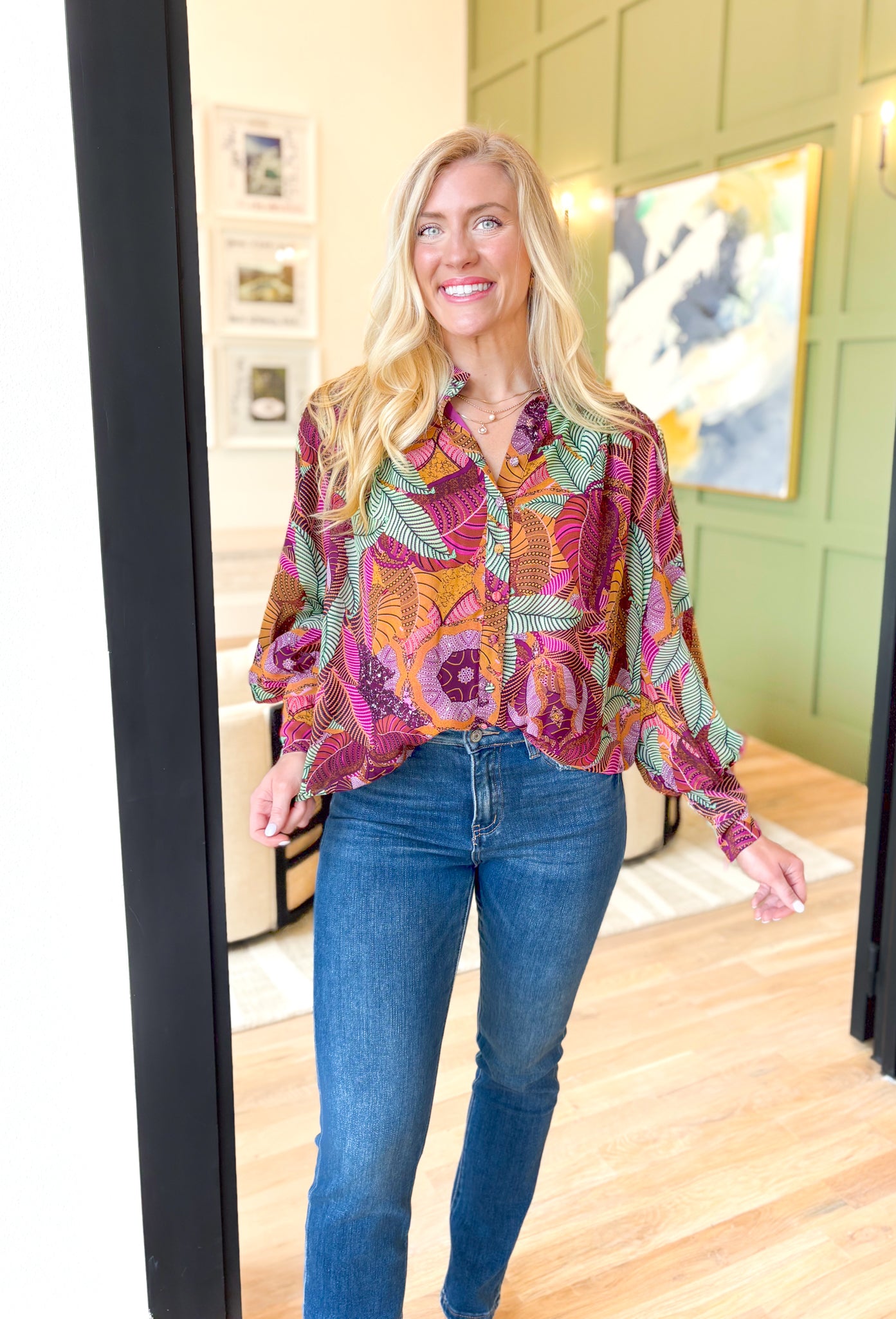 By Your Side Blouse, long sleeve button down blouse with abstract palm leaves in the colors burnt orange, sage green, magenta, deep plum, lilac, pink, cognac, and mustard, zipper detail on the wrists to make them fitted