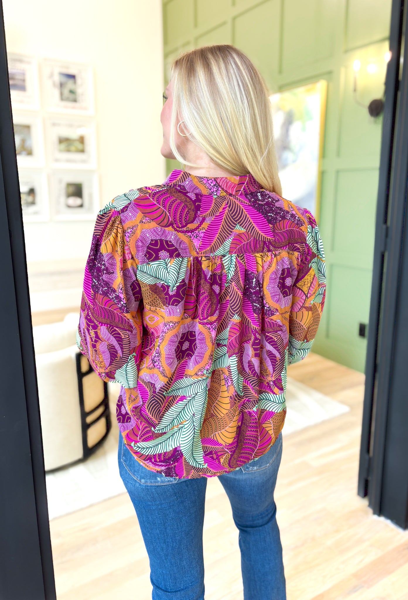 By Your Side Blouse, long sleeve button down blouse with abstract palm leaves in the colors burnt orange, sage green, magenta, deep plum, lilac, pink, cognac, and mustard, zipper detail on the wrists to make them fitted