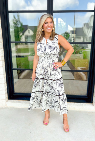 Can't Relate Midi Dress, black and white feather patterned sleeveless dress with cinching at the waist and tiering, black lace on each tier 