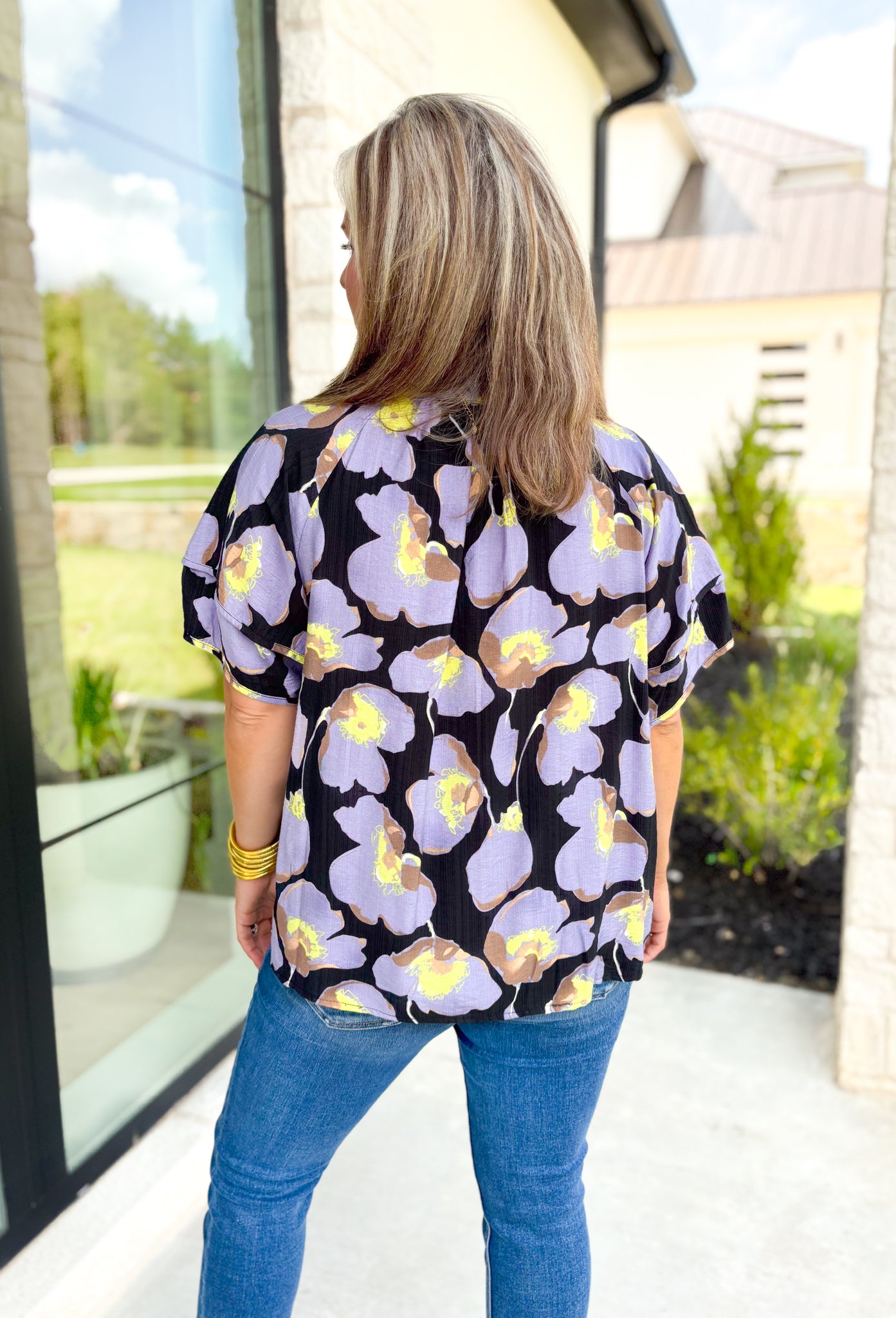 Can't Stop You Floral Top, short sleeve v-neck floral blouse in the colors lilac, black, lime, and taupe