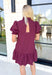 Caught Crushing Dress in Merlot, puff sleeve dress with smocked v-neck line and smocking on the hem of the sleeve, tier detail on the bottom hem of the dress 