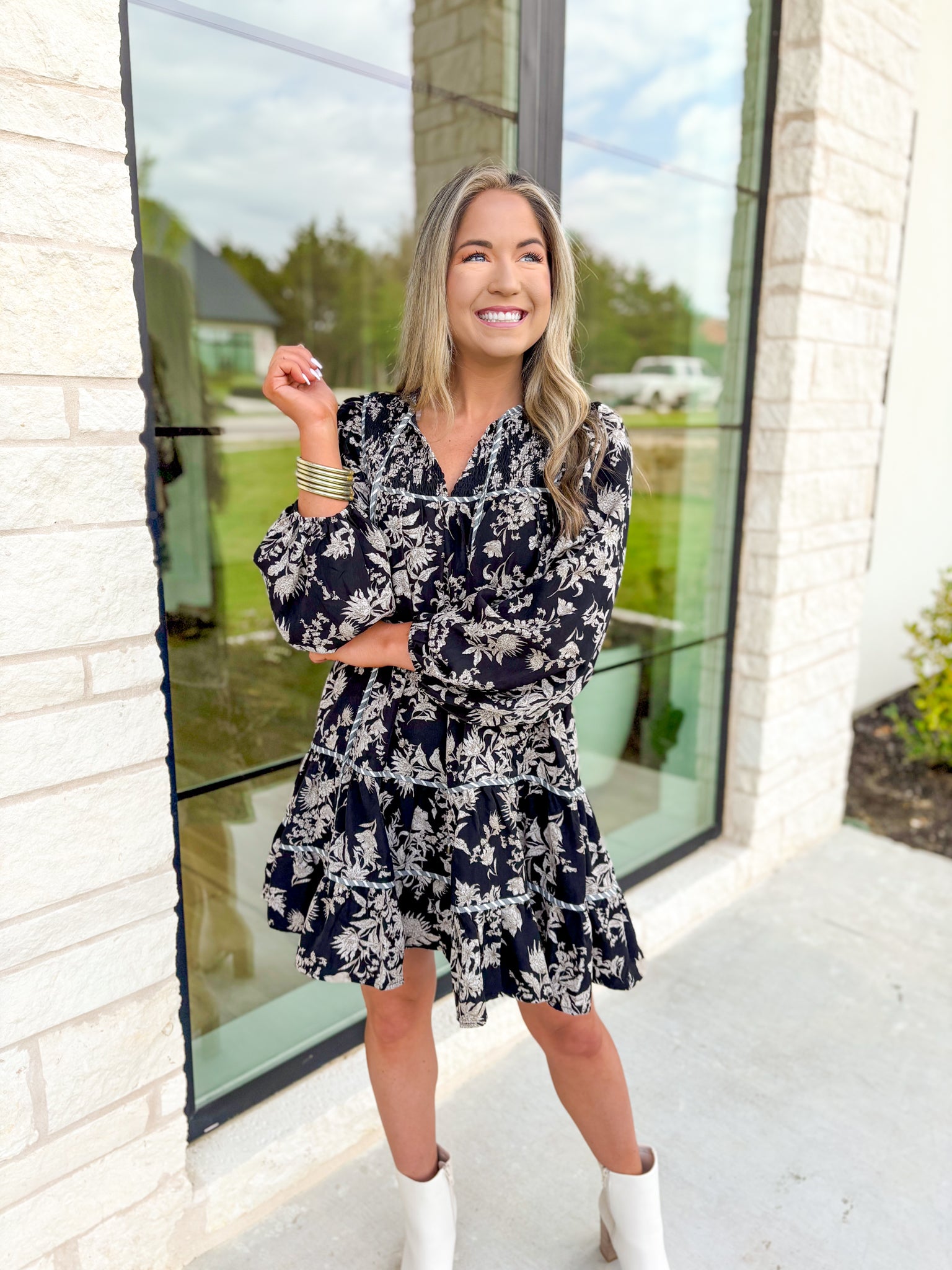 Dream About It Floral Dress, black, taupe, and white long sleeve tiered floral dress with v-neck line, grey and white horizontal stripe piping on the tiers and neck line