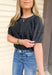 Fast Pace Top in Black, washed black short puff sleeve top with seam details 