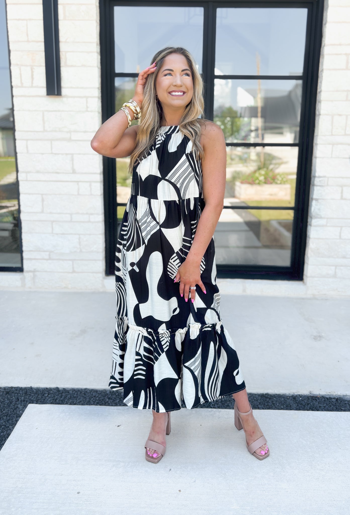 Feel This Moment Midi Dress, black and white abstract shaped high neck tiered sleeveless midi dress with ruffle details on the bottom tier and bow detail on the back of the neck 