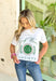 Friday + Saturday: Golf Wives T-Shirt, white t-shirt with kelly green text "abandoned golf wives society" with pink and kelly green golf club emblem 