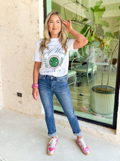 Friday + Saturday: Golf Wives T-Shirt, white t-shirt with kelly green text "abandoned golf wives society" with pink and kelly green golf club emblem 