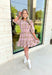 Heading South Plaid Dress, light pink, cognac, and off white plaid puff sleeve mini dress with cinching at the waist with light pink velvet details layered on top of the cinching, tier on the bottom of the dress with ruffle hem detail 