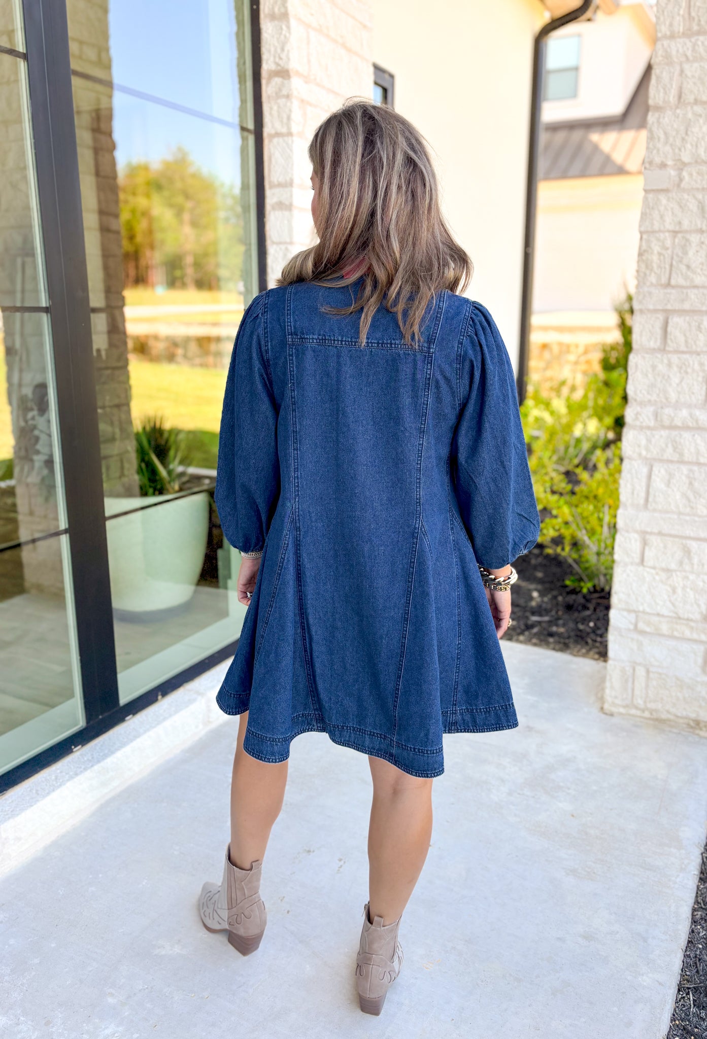 Just A Game Denim Dress, long sleeve button down denim dress with pockets on the side as well as on the chest, cinched wrists