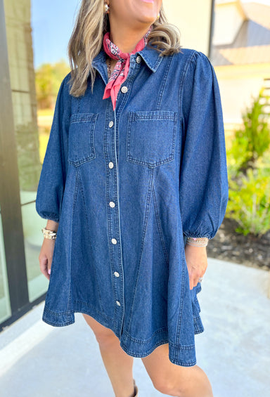 Just A Game Denim Dress, long sleeve button down denim dress with pockets on the side as well as on the chest, cinched wrists