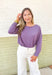 Lilly Sweater by Dreamers in Acai, washed purple soft knit sweater with wide neck line and ribbed detail on the wrists and hem 