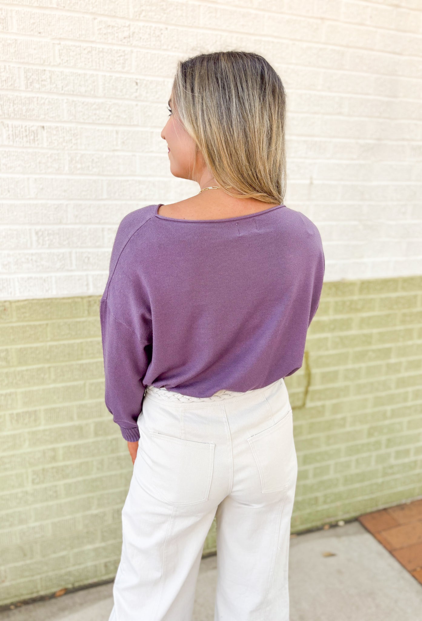 Lilly Sweater by Dreamers in Acai, washed purple soft knit sweater with wide neck line and ribbed detail on the wrists and hem 