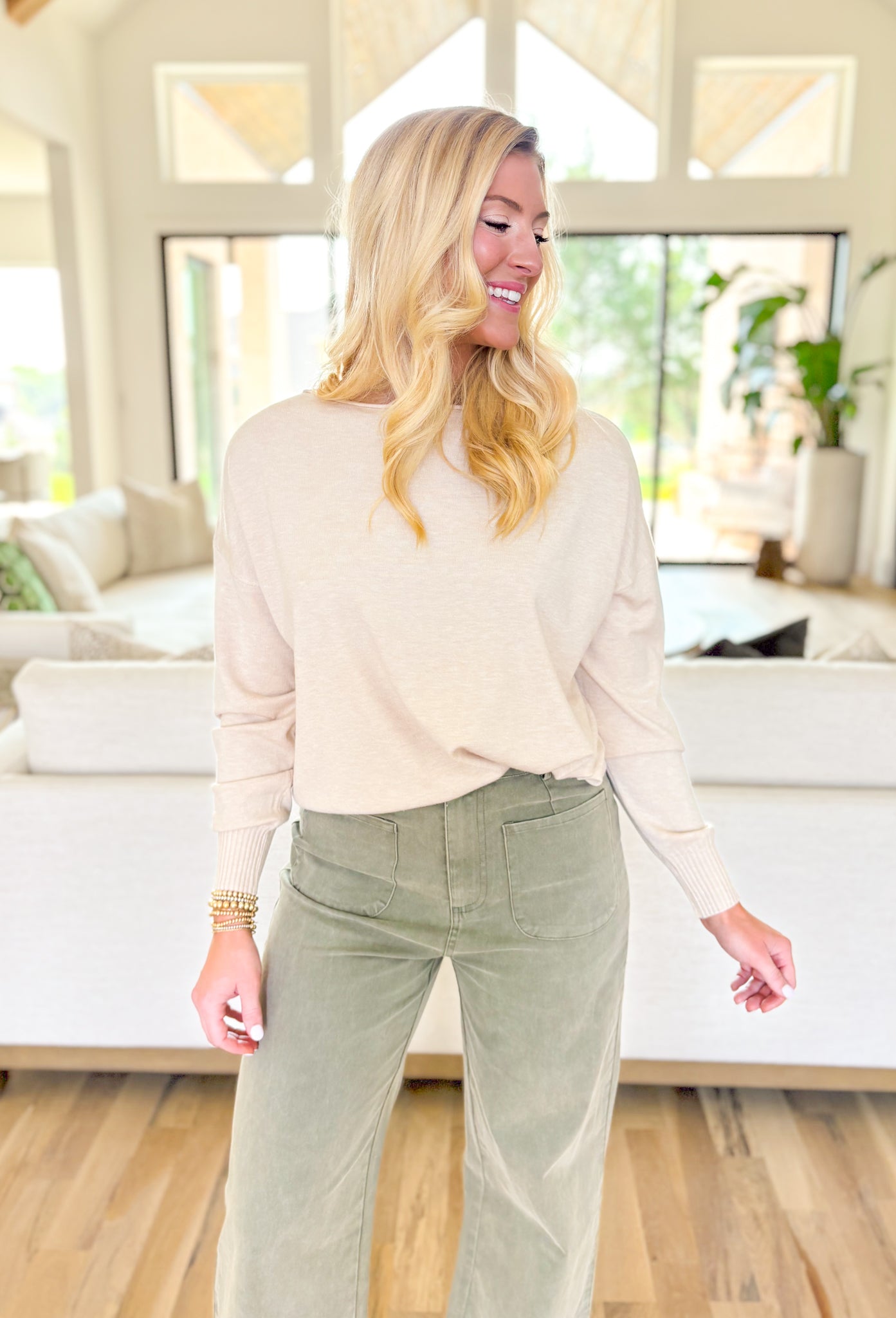 Lilly Sweater by Dreamers in Heathered Oatmeal, cream soft knit sweater with wide neck line and ribbed detail on the wrists and hem 