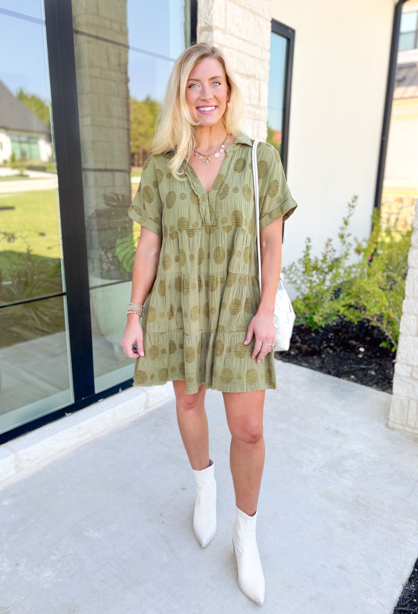 Living In The Moment Dress in Olive, short sleeve v-neck tiered dress in olive green with mesh circle peek-a-boo details across the whole dress