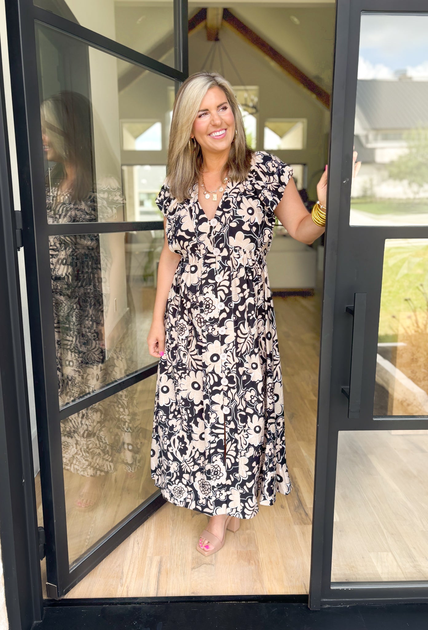 Lola Floral Midi Dress, short sleeve floral midi dress in black, white, and tan with large buttons down the center  