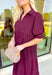 London Calling Midi Dress, wine colored puff sleeve tiered midi dress with cinching on the hem of the sleeves and a v-neck line 