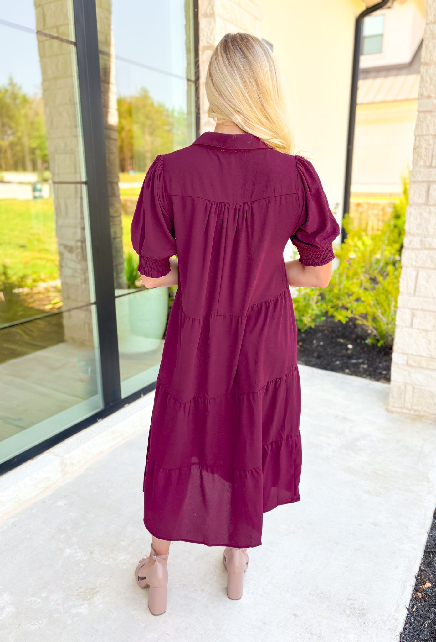 London Calling Midi Dress, wine colored puff sleeve tiered midi dress with cinching on the hem of the sleeves and a v-neck line 