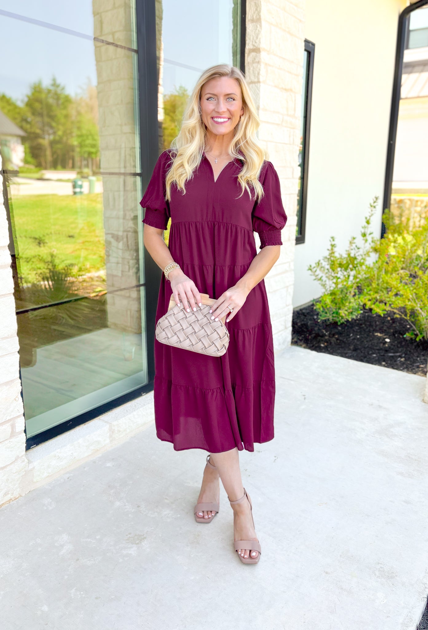 London Calling Midi Dress, wine colored puff sleeve tiered midi dress with cinching on the hem of the sleeves and a v-neck line 