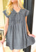 Lucky Me Denim Dress, washed charcoal denim dress with cap sleeves, v-neckline, pleating across the chest, pockets, and bow detail on  the bottom of the neckline