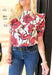 Make It Known Floral Blouse in Red, red, off white, and black floral blouse, modest neck line, puff sleeves, and ruffling in a v pattern down the chest