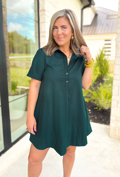 Moment In Time Dress in Forest, short sleeve quarter length button down dress with collar and one pleat on the front and back of the dress in a dark forest green 