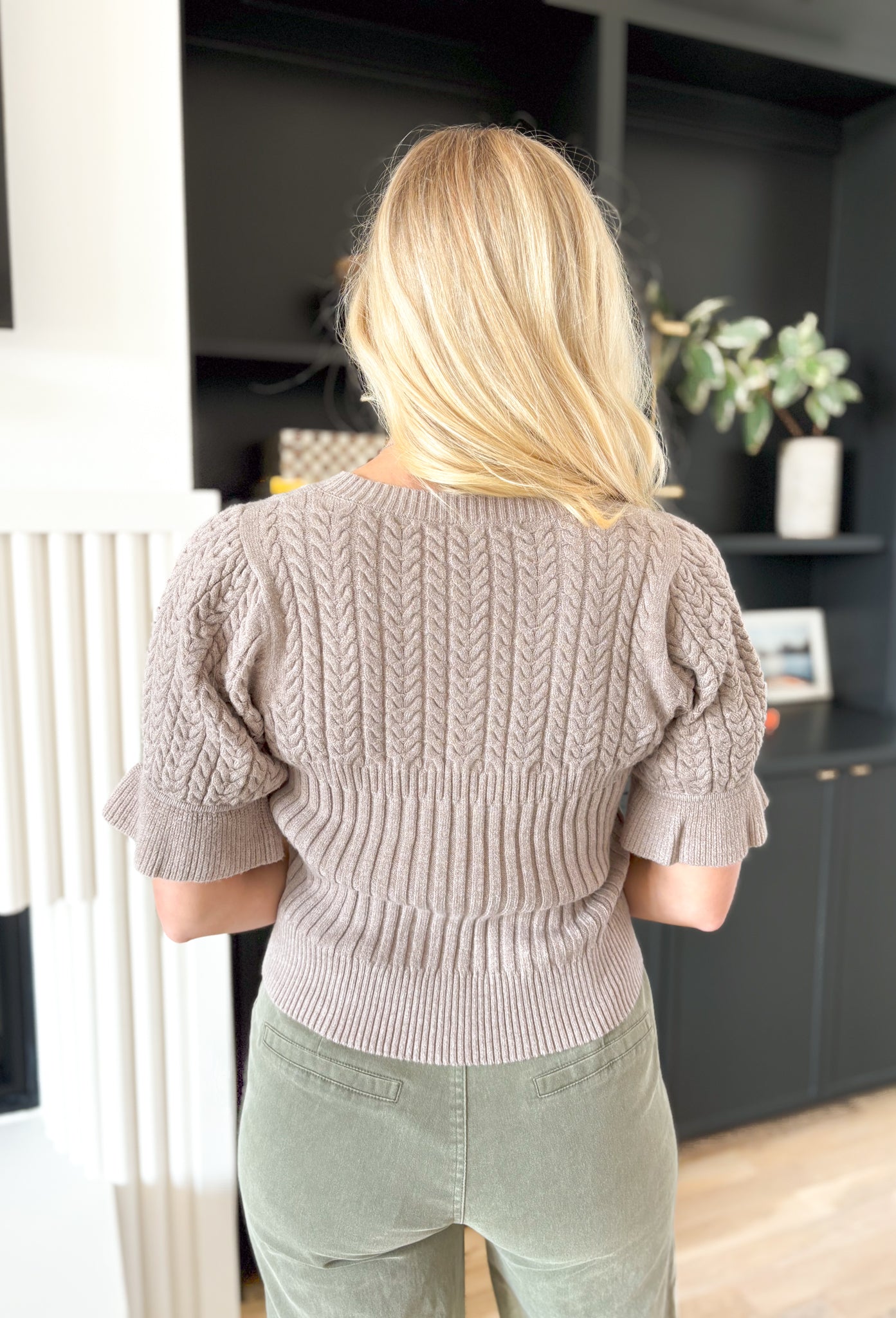 My Wishes Sweater in Mocha, taupe knit short sleeve top with ribbing on the body of the top and a slight flutter detail on the hem of the sleeve 