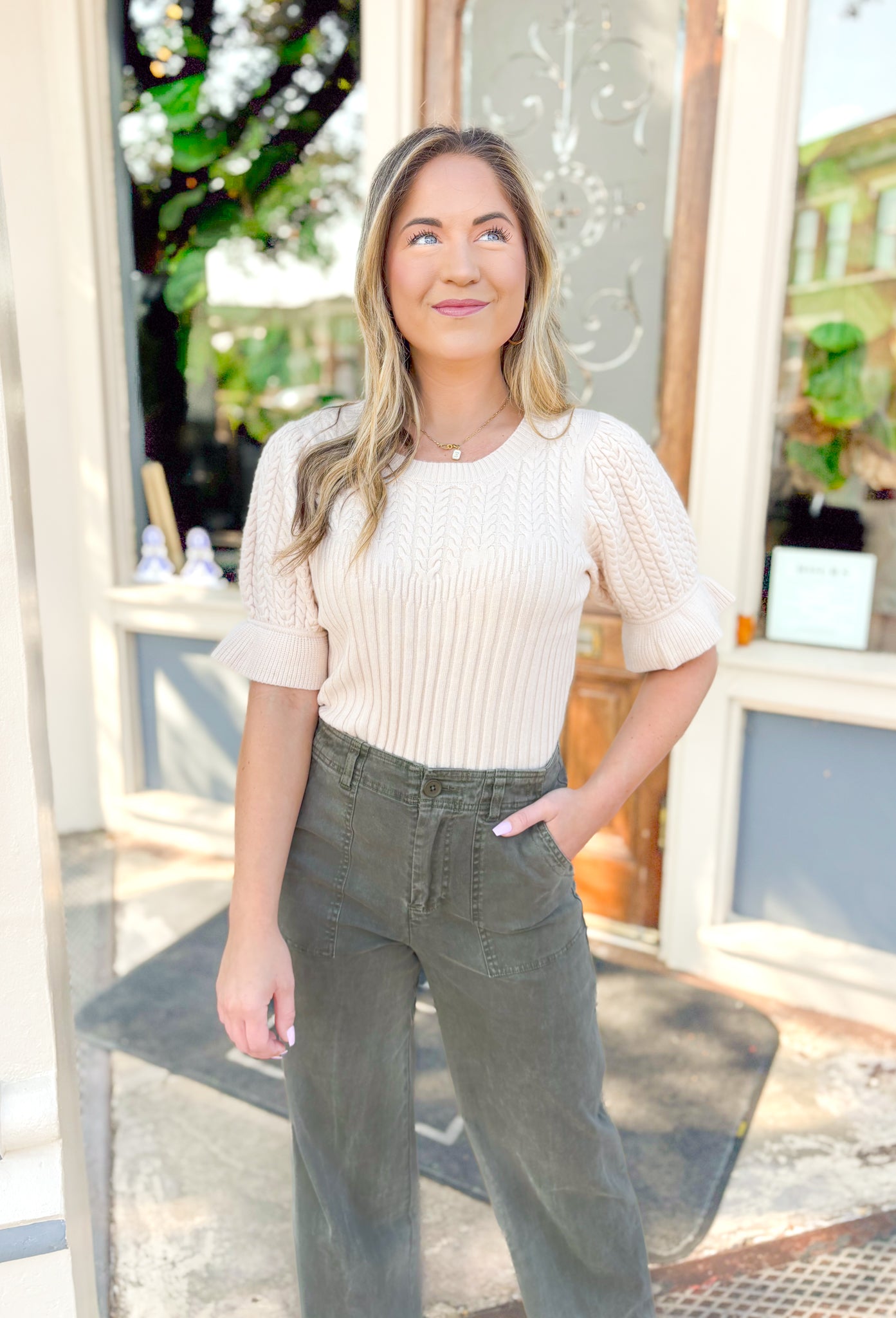 My Wishes Sweater in Oatmeal, cream knit short sleeve top with ribbing on the body of the top and a slight flutter detail on the hem of the sleeve 