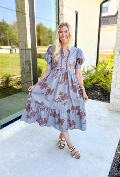 No Looking Back Midi Dress, pale grey blue puff sleeve midi dress with cedar brown floral print and scalloping down the middle of the chest, on tier on the bottom of the dress, pockets