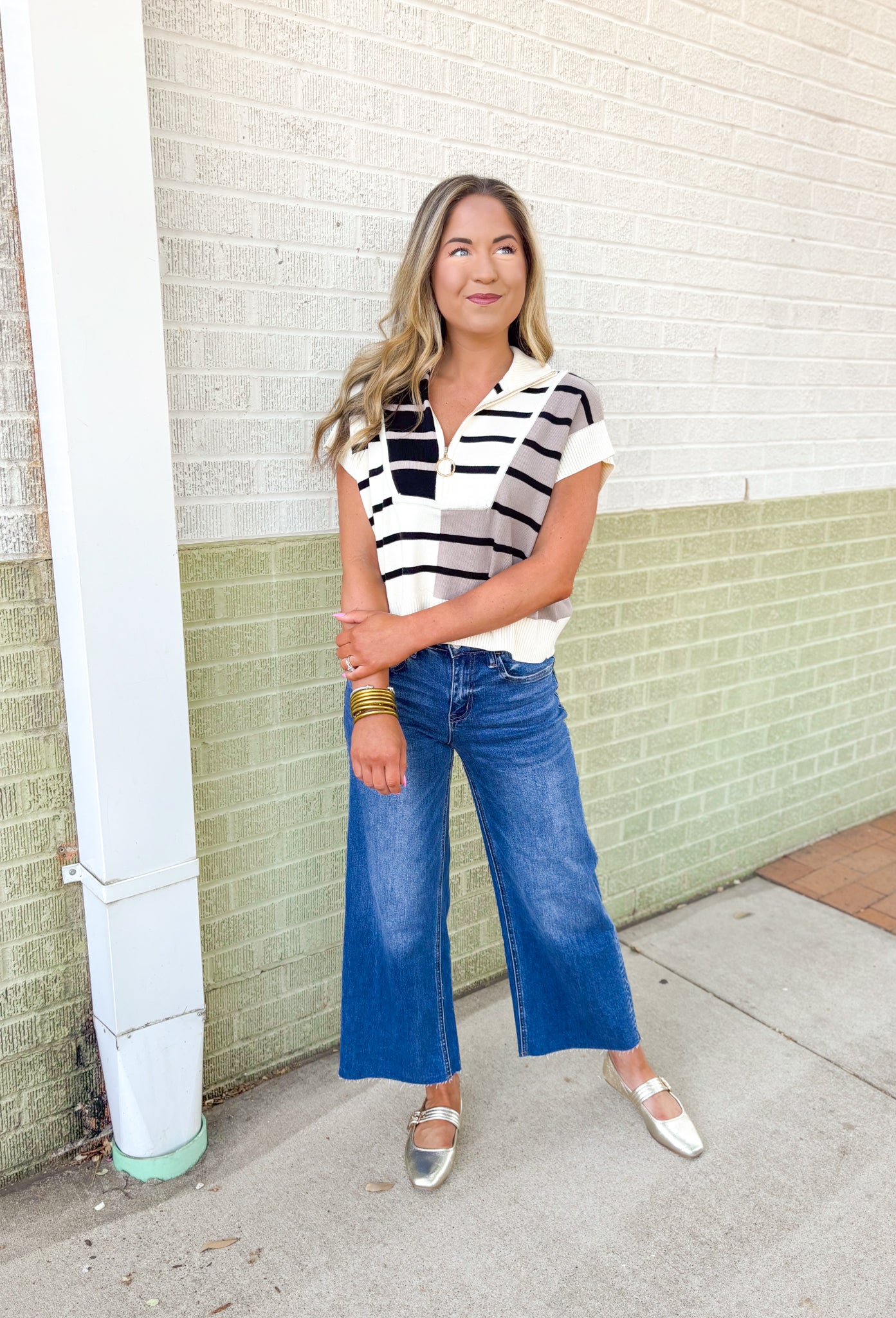 Parting Ways Top, short sleeve sweater top in a color block and striped pattern in the colors taupe, black, and cream, quarter zip detail and collar 