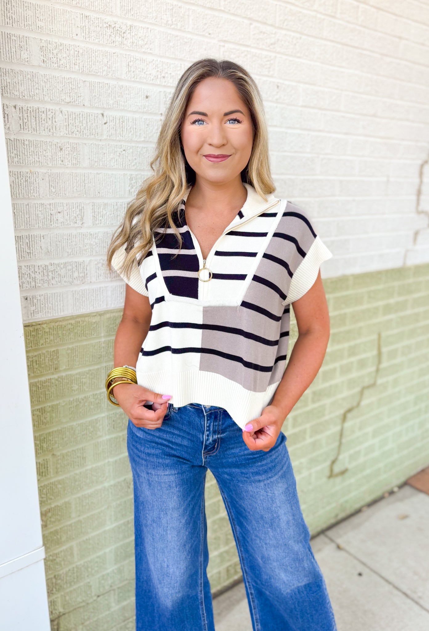 Parting Ways Top, short sleeve sweater top in a color block and striped pattern in the colors taupe, black, and cream, quarter zip detail and collar 