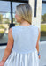 Pay The Price Dress, heathered grey jacquard fabric cropped tank over a white and dark grey pin stripped dress with pockets, heart detail on the back of the dress 