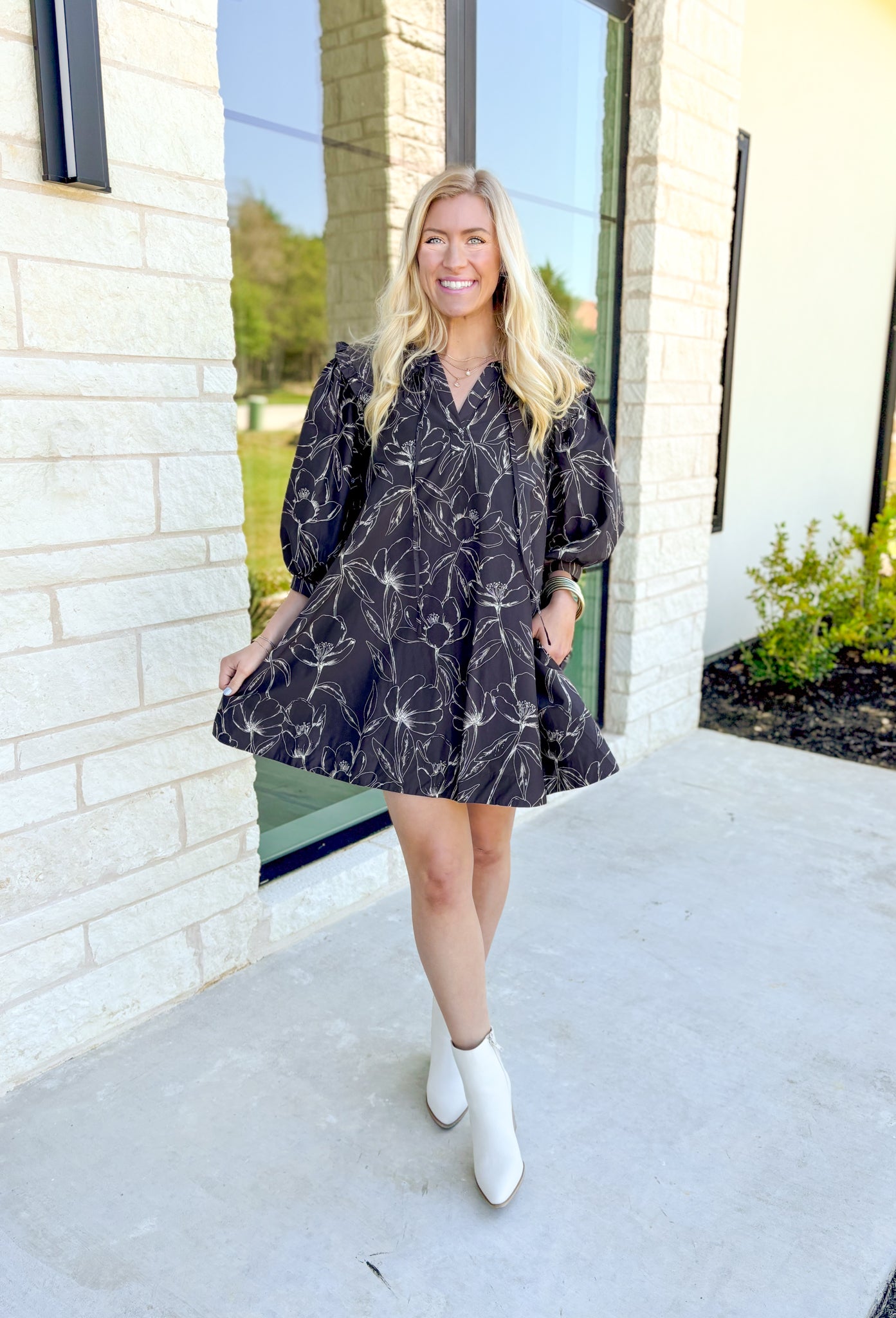 Quiet Moments Floral Dress, quarter puff sleeve mini dress in a deep charcoal grey with cream floral print, platter collar, pockets