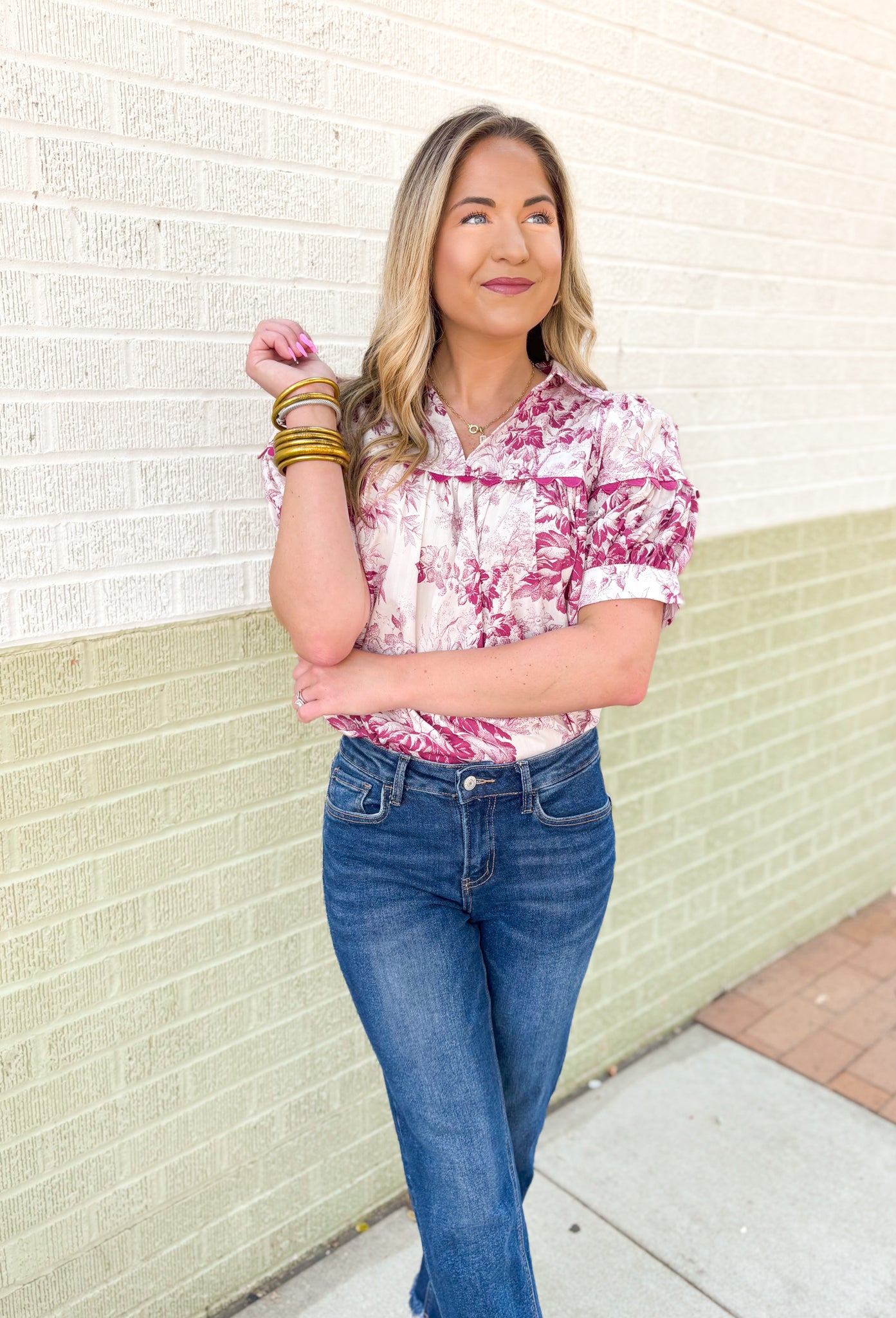 Roaming Rome Floral Blouse, short sleeve plum and off white floral blouse with collar, v-neck, and plum scalloped lace across the chest and around the center of the puff sleeve