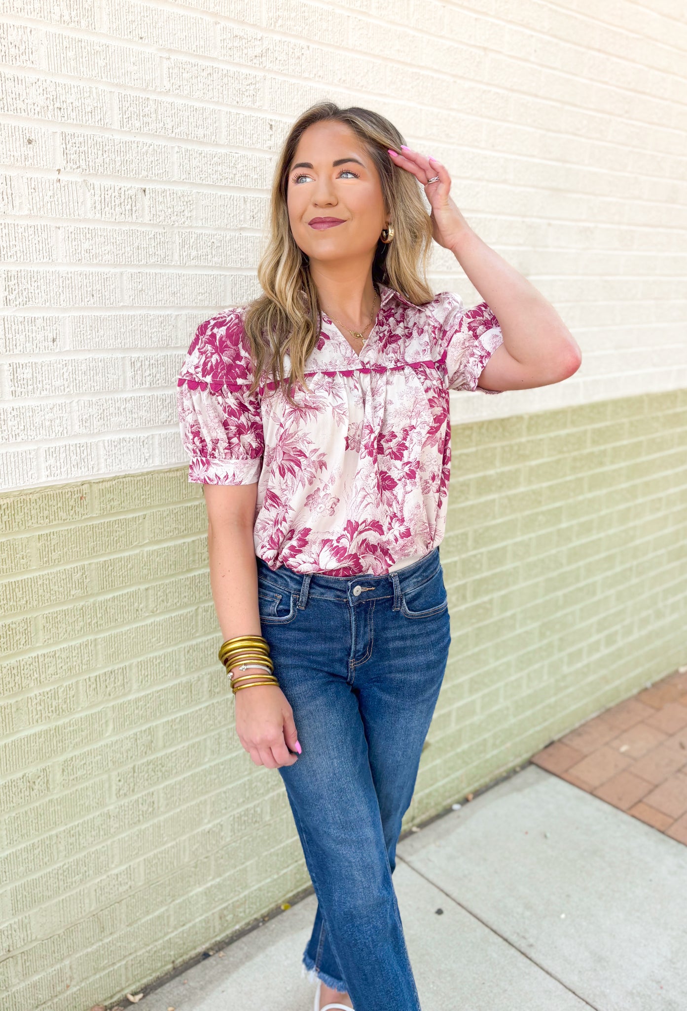 Roaming Rome Floral Blouse, short sleeve plum and off white floral blouse with collar, v-neck, and plum scalloped lace across the chest and around the center of the puff sleeve