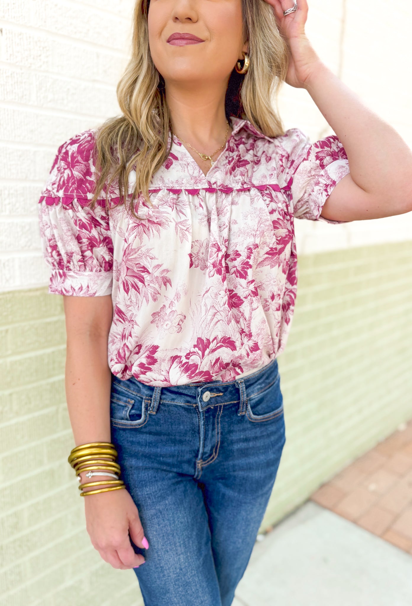 Roaming Rome Floral Blouse, short sleeve plum and off white floral blouse with collar, v-neck, and plum scalloped lace across the chest and around the center of the puff sleeve