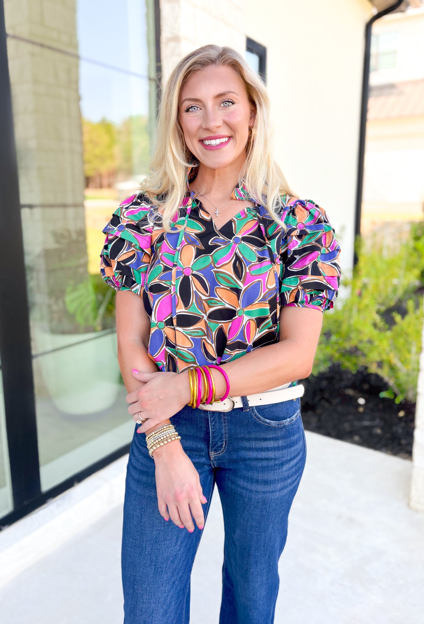 Secret Message Floral Blouse, black, pink, orange, green, blue, and brown floral puff sleeve blouse with ruffling on the neck 