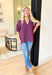 Tell Me The Truth Top, short sleeve blouse in a deep plum, stitch details on the sleeves and bottom of the blouse, v-neckline 