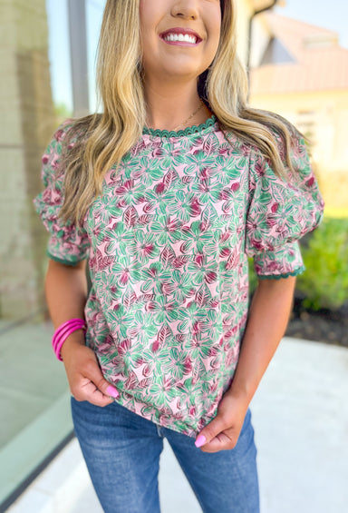 Too Good To Me Top, forest green, light pink, and deep magenta short sleeve blouse with forest green scalloped lace trim on the neck and sleeve hem  