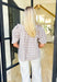 Trust Yourself Top, taupe, light blue, and white plaid puff sleeve blouse with ruffling on the shoulder and a v-neck line 