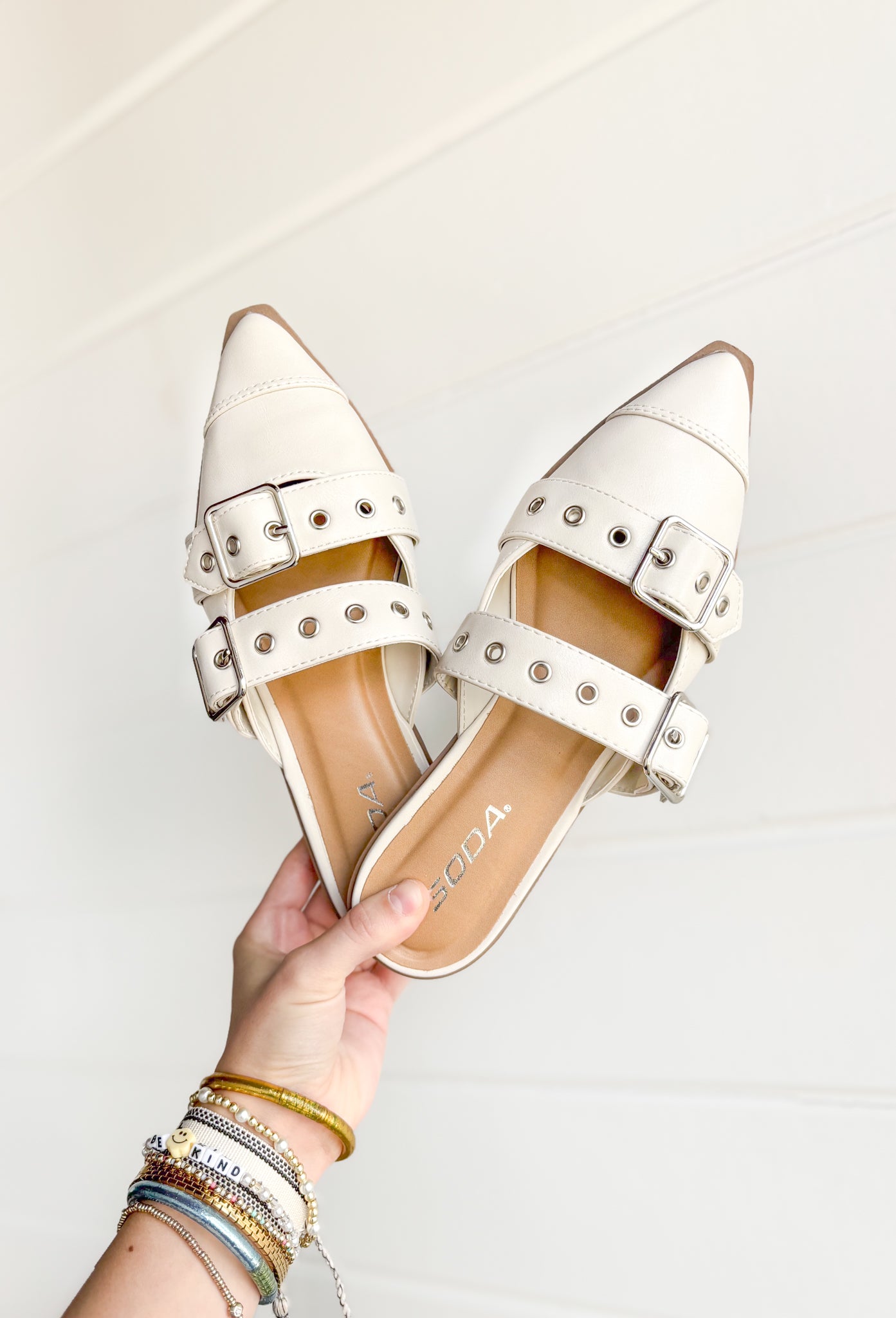 Usual Off White Mules, off white pointed top flat with two buckle details 