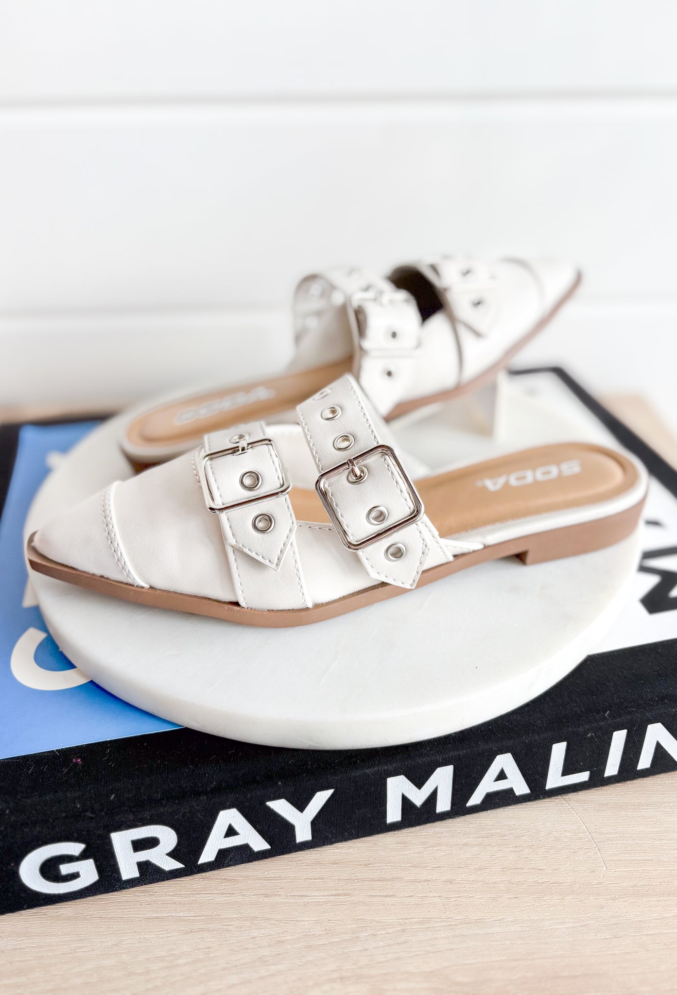 Usual Off White Mules, off white pointed top flat with two buckle details 