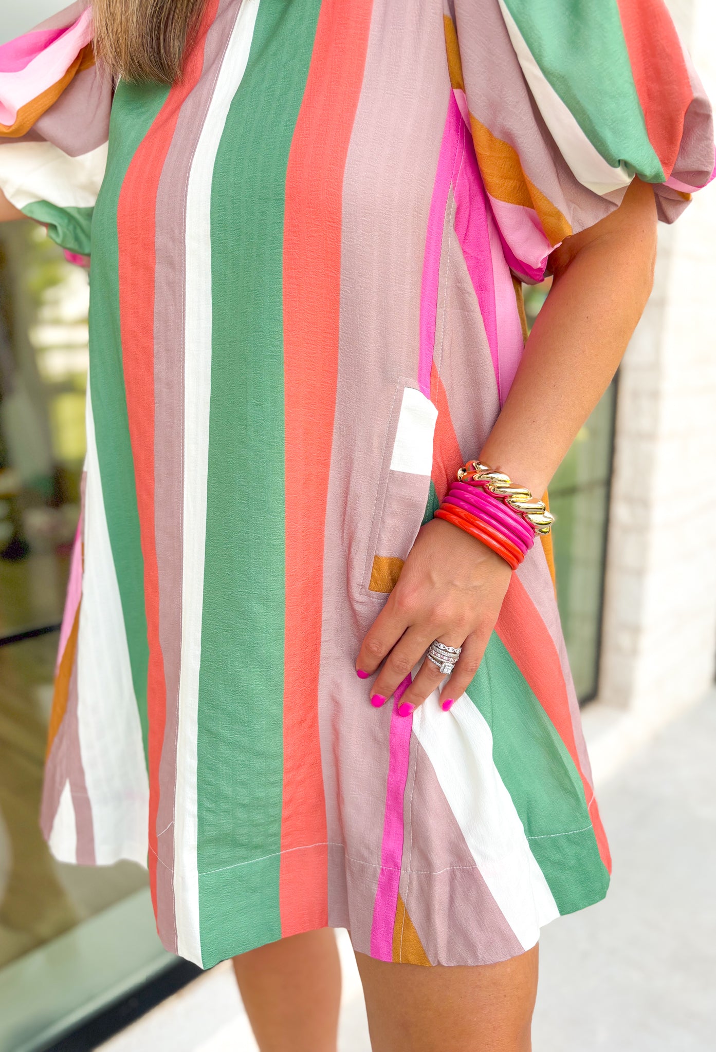 What A Feeling Dress in Multi, puff sleeve striped dress with pockets in the colors burnt orange, mustard, green, cream, taupe, light pink and hot pink 