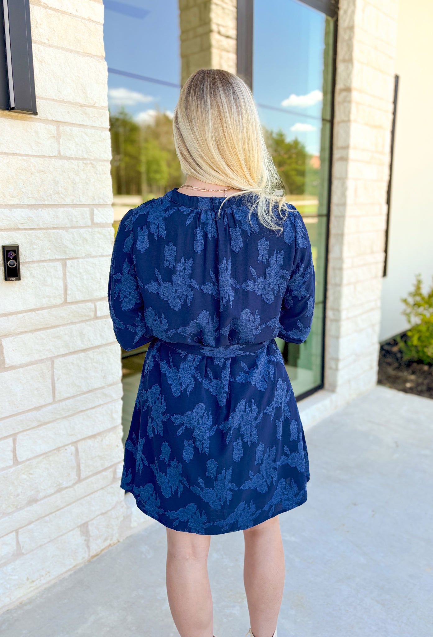 When I See You Dress, deep blue textured floral quarter sleeve dress with collar and quarter button down detail on the front, tie belt around the waist 