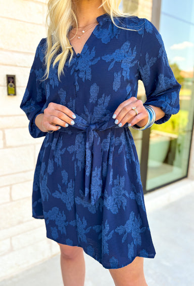 When I See You Dress, deep blue textured floral quarter sleeve dress with collar and quarter button down detail on the front, tie belt around the waist 