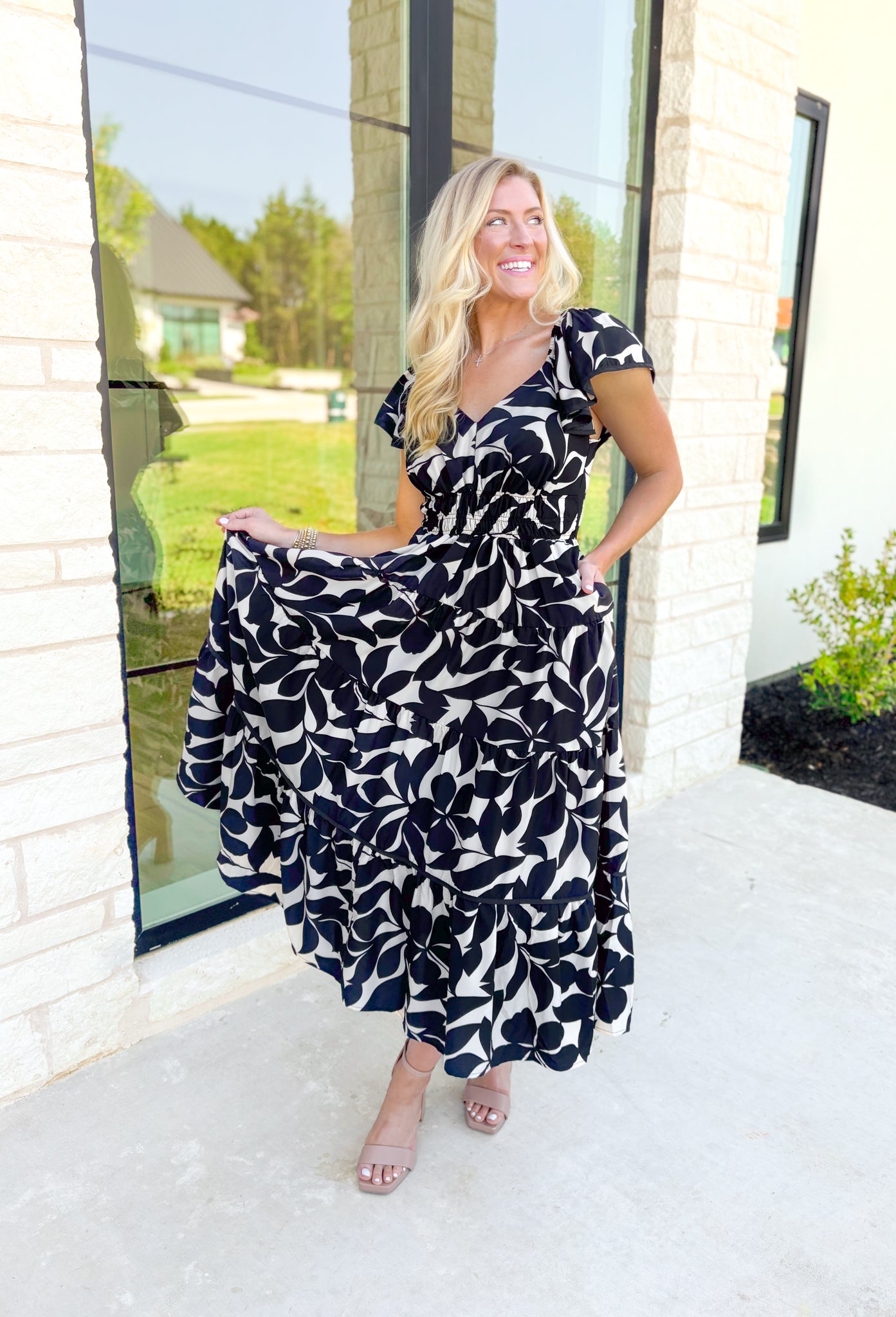 Wishing For More Midi Dress, ruffle sleeve soft v-neck cinched waist tiered midi dress in a black and off white floral print