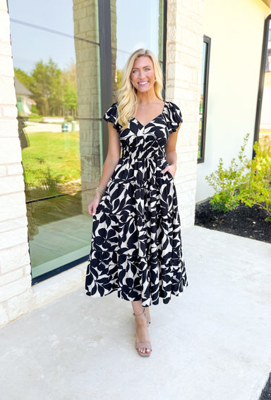 Wishing For More Midi Dress, ruffle sleeve soft v-neck cinched waist tiered midi dress in a black and off white floral print